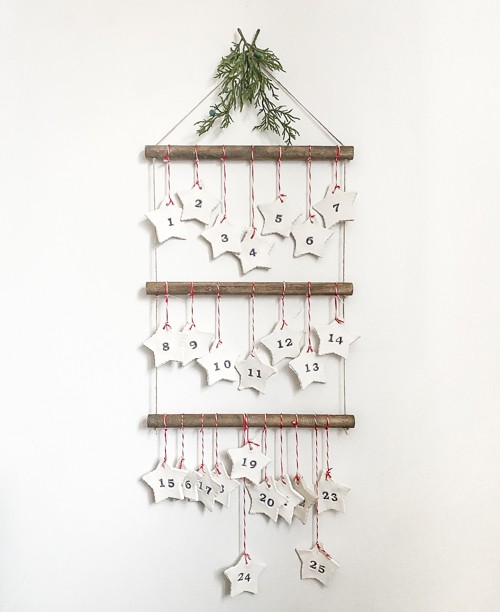 Discover how to make this DIY Scandinavian Advent Calendar with this step-by-step tutorial! It is easy and the kids can help you make it!