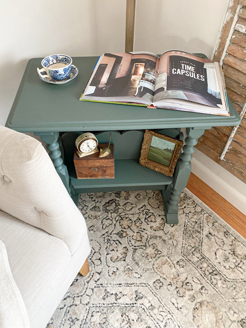 This DIY painted end table makeover is a step-by-step tutorial showing how to clean, and remove loose veneer, sand, and paint to get a beautiful piece.