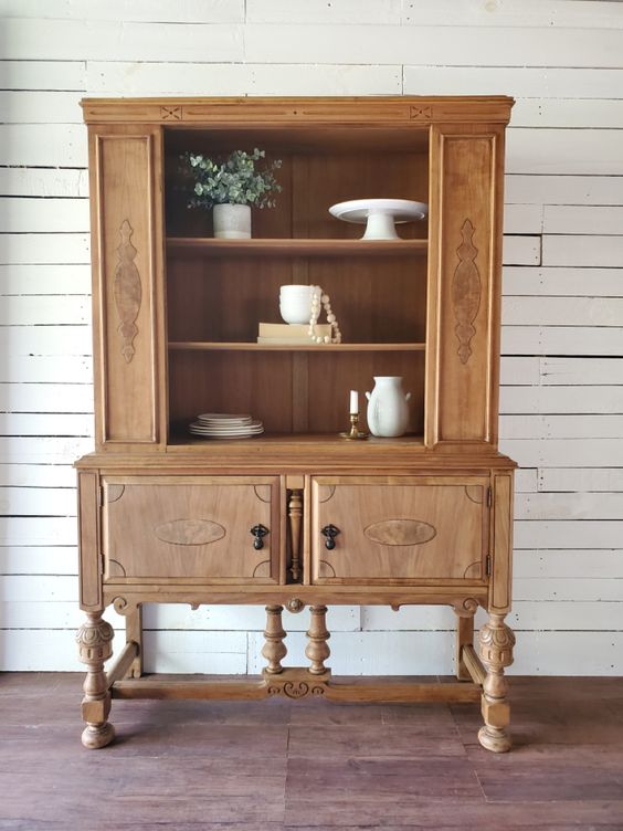 Discover 10 Best Hutch Makeovers Without Paint! From decoupage to staining, there are many ways to give a hutch a fresh look without using paint.