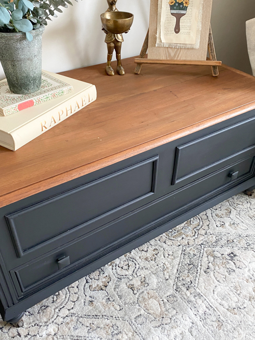 An Antique Coffee Table Makeover tutorial that will show you how to transform an old piece with sanding, painting, and staining for a stunning transformation.