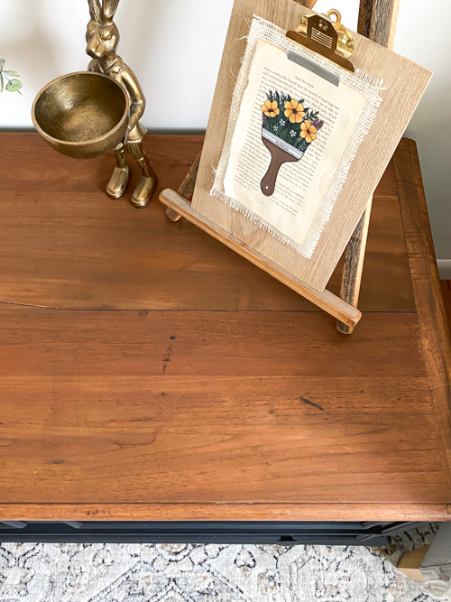 An Antique Coffee Table Makeover tutorial that will show you how to transform an old piece with sanding, painting, and staining for a stunning transformation.