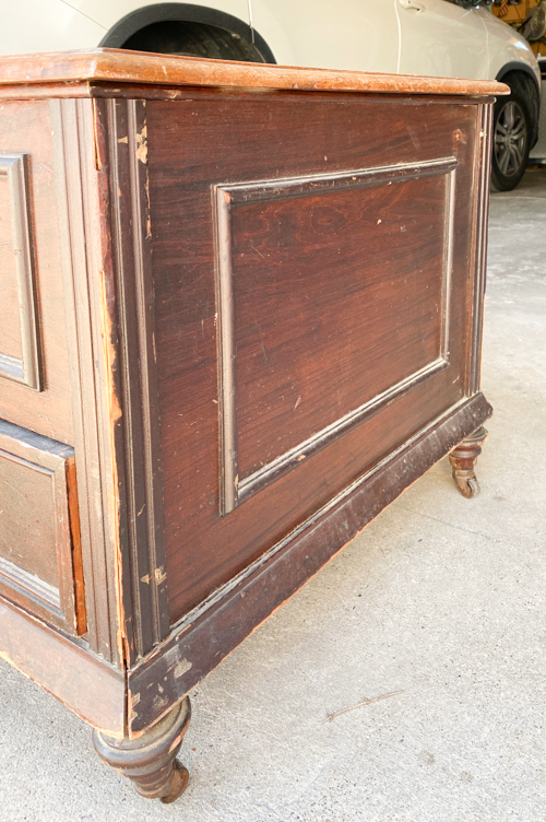 An Antique Coffee Table Makeover tutorial that will show you how to transform an old piece with sanding, painting, and staining for a stunning transformation.