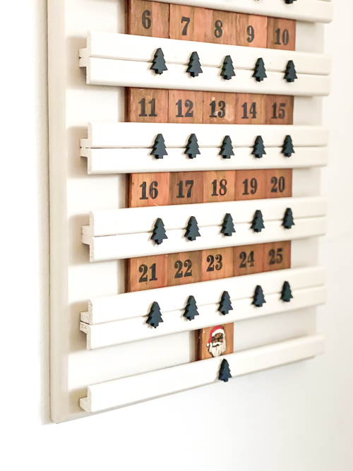 Transform a thrift store find into a festive DIY thrifted advent calendar! This budget-friendly upcycling project is perfect for a creative Christmas countdown.