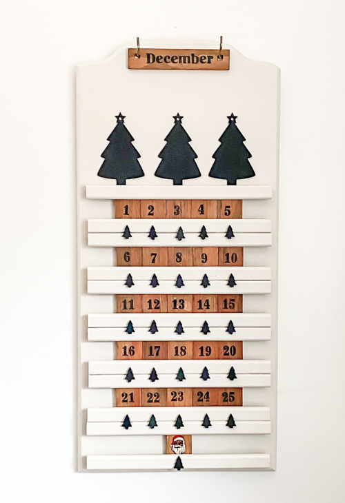 Transform a thrift store find into a festive DIY thrifted advent calendar! This budget-friendly upcycling project is perfect for a creative Christmas countdown.