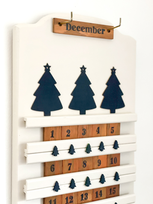 Transform a thrift store find into a festive DIY thrifted advent calendar! This budget-friendly upcycling project is perfect for a creative Christmas countdown.