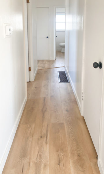Affordable Durable Laminate Flooring: Transforming Our Flip House - My ... - Durable Laminate Flooring For Homes With Kids