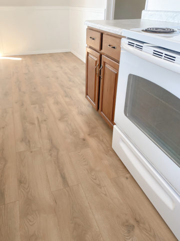 Affordable Durable Laminate Flooring: Transforming Our Flip House - My ...