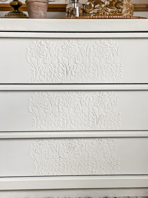 Raised Stencil Dresser Makeover using Durham’s Rock Hard Water Putty for texture. See how a plain 3-drawer chest gets a stunning transformation!