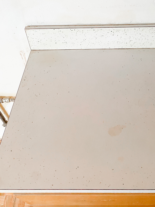 Affordable kitchen cabinets and countertops from CKF transformed our flip kitchen. See our design process, finishes, and budget-friendly tips!
