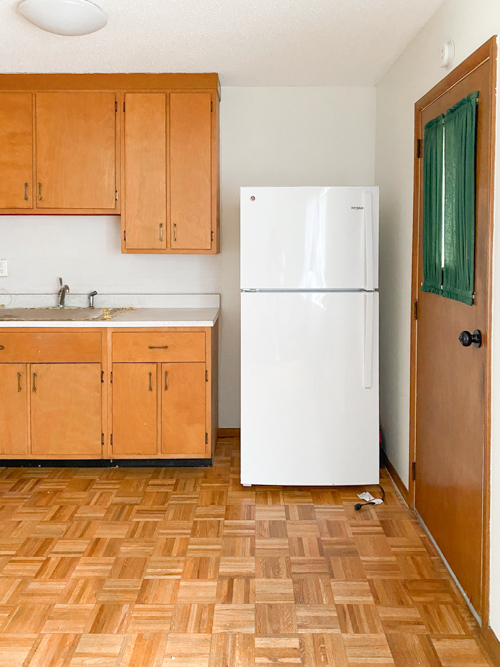 Affordable kitchen cabinets and countertops from CKF transformed our flip kitchen. See our design process, finishes, and budget-friendly tips!