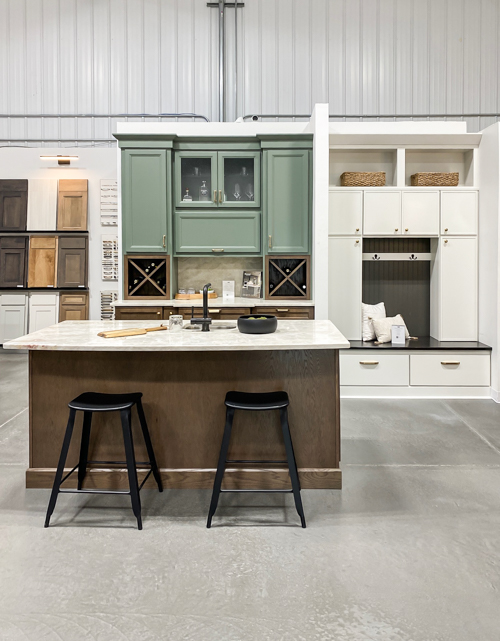 Affordable kitchen cabinets and countertops from CKF transformed our flip kitchen. See our design process, finishes, and budget-friendly tips!