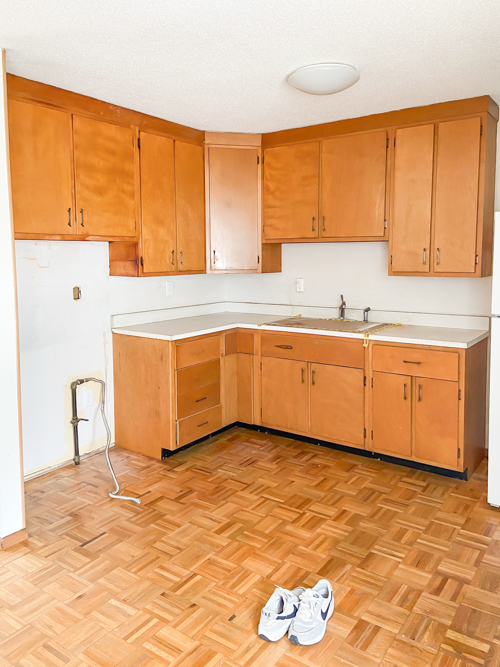 Discover how we transformed our flip house kitchen with affordable kitchen cabinets and countertops from CKF. See our design process, finish choices, and budget-friendly tips!