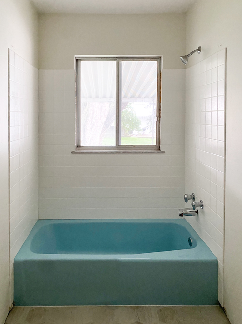 Transform your bathroom with a budget shower tile makeover without demolition. Easy DIY project with lasting results using our favorite paint kit.