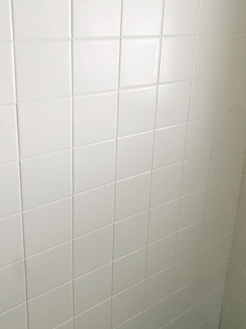 Transform your bathroom with a budget shower tile makeover without demolition. Easy DIY project with lasting results using our favorite paint kit.