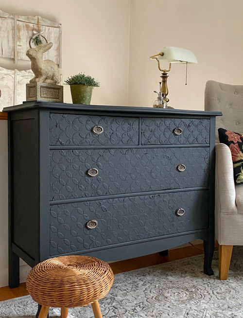 Give a dated piece new life with this Textured Furniture Makeover! Learn how to modernize a vintage dresser using a simple raised stencil technique.