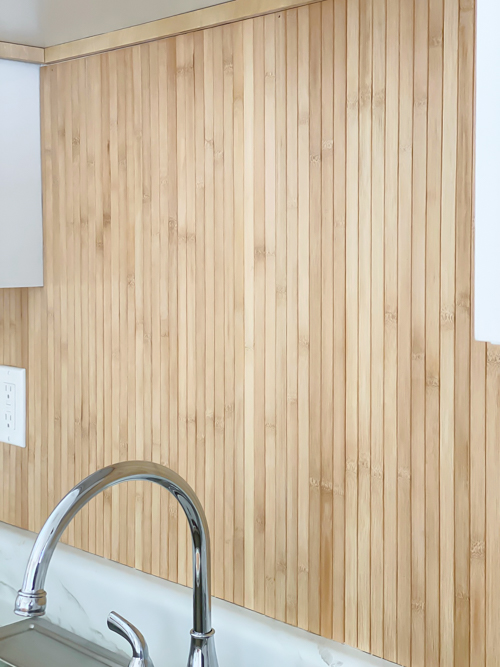 DIY Pole Wrap Kitchen Backsplash tutorial: budget-friendly, tile-free, and easy to install. Transform your kitchen with this simple step-by-step guide.