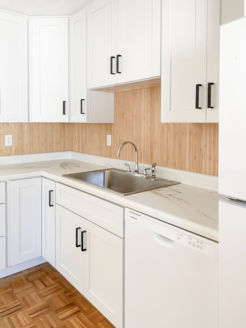 DIY Pole Wrap Kitchen Backsplash tutorial: budget-friendly, tile-free, and easy to install. Transform your kitchen with this simple step-by-step guide.