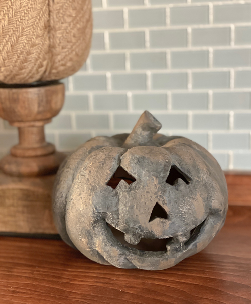 Create a DIY Black Terracotta Jack O’ Lantern Pottery Barn dupe for a fraction of the cost. Easy thrift flip tutorial with supplies and video tutorial.