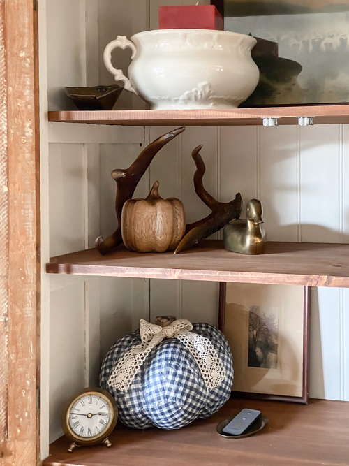 Create cozy fall vibes with this easy DIY Gingham Pumpkin Decor tutorial! Learn how to make budget-friendly gingham pumpkins for your home.