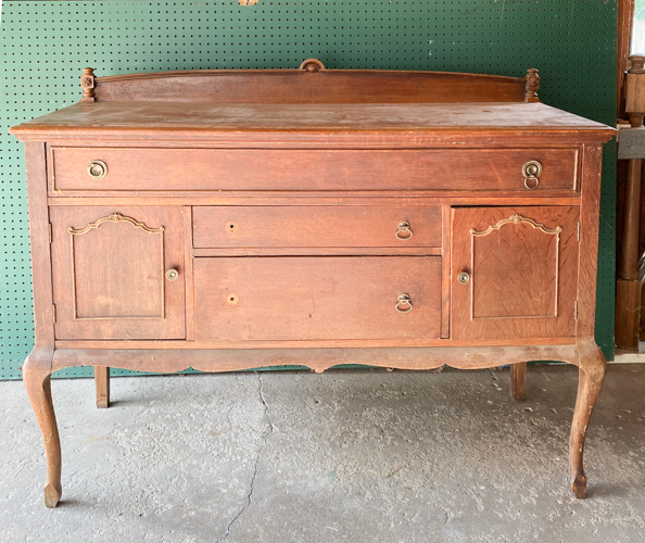 See how this French Country Buffet Makeover turned an outdated piece into a stunning focal point with French Linen paint and black hardware.