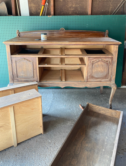 See how this French Country Buffet Makeover turned an outdated piece into a stunning focal point with French Linen paint and black hardware.