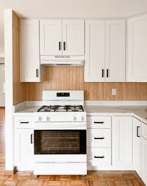 Affordable kitchen cabinets and countertops from CKF transformed our flip kitchen. See our design process, finishes, and budget-friendly tips!
