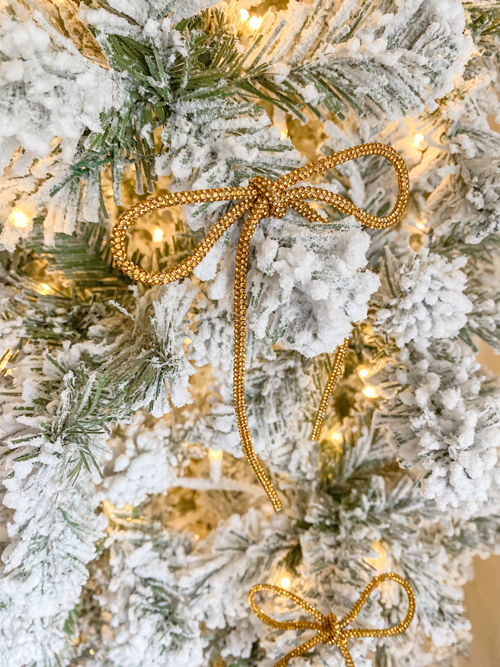 DIY Rhinestone Bow Christmas Ornaments add sparkle and style to your holiday décor. Easy, affordable, and perfect for this year’s trending bow look!