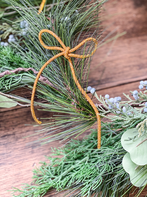 DIY Rhinestone Bow Christmas Ornaments add sparkle and style to your holiday décor. Easy, affordable, and perfect for this year’s trending bow look!