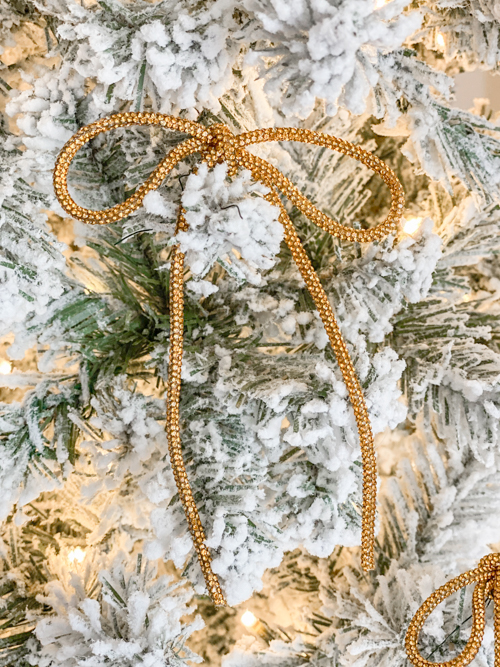 DIY Rhinestone Bow Christmas Ornaments add sparkle and style to your holiday décor. Easy, affordable, and perfect for this year’s trending bow look!