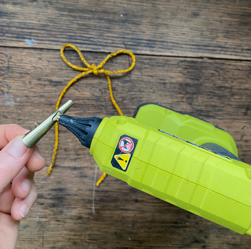 DIY Rhinestone Bow Christmas Ornaments add sparkle and style to your holiday décor. Easy, affordable, and perfect for this year’s trending bow look!