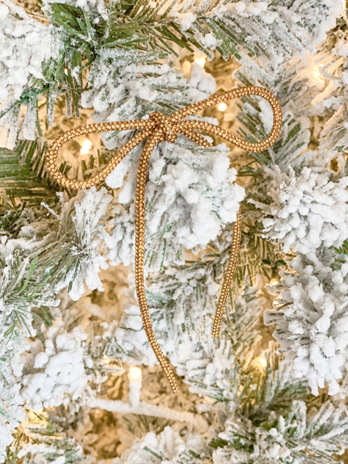 DIY Rhinestone Bow Christmas Ornaments add sparkle and style to your holiday décor. Easy, affordable, and perfect for this year’s trending bow look!