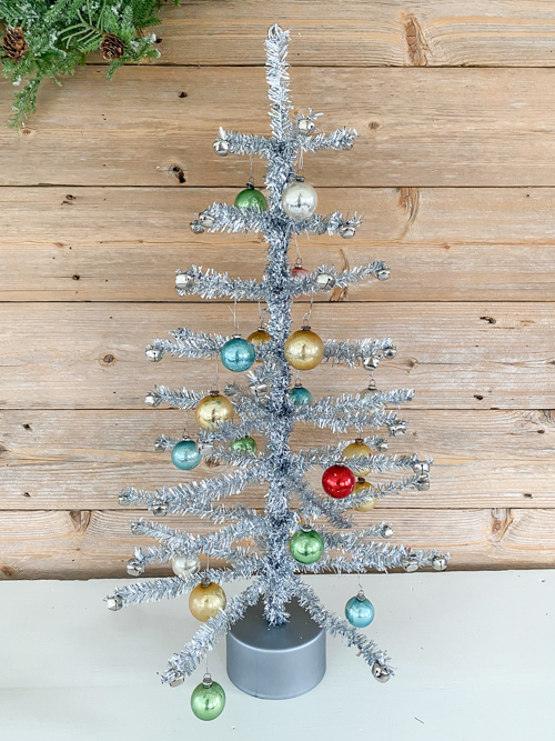 Discover how to craft a DIY Vintage Aluminum Christmas Tree with budget-friendly materials. A fun retro project to add sparkle and vintage charm to your holidays.