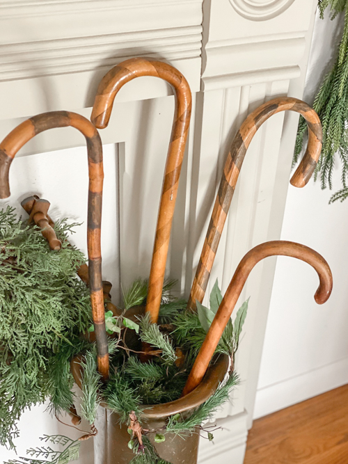 Transform old wooden canes into beautiful Christmas decor with this DIY Wooden Candy Canes tutorial. Simple, budget-friendly, and perfect for holiday decor.