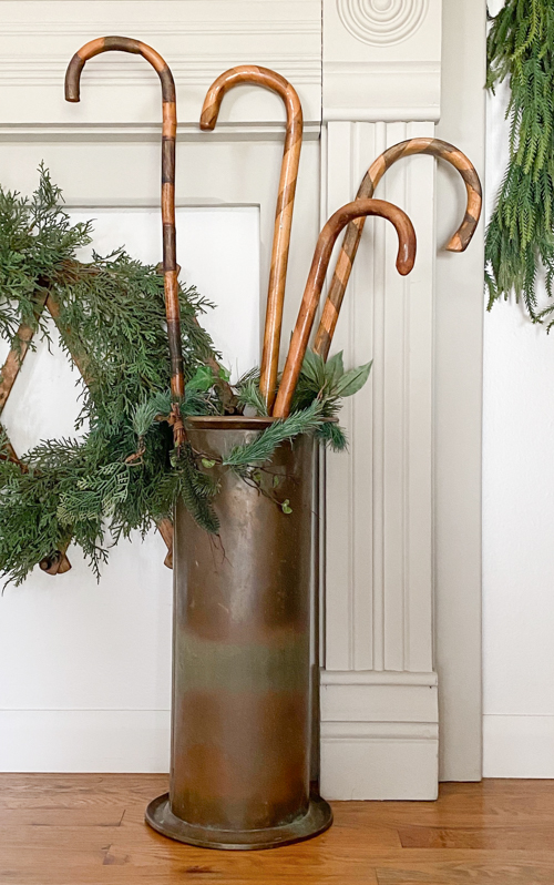 Transform old wooden canes into beautiful Christmas decor with this DIY Wooden Candy Canes tutorial. Simple, budget-friendly, and perfect for holiday decor.