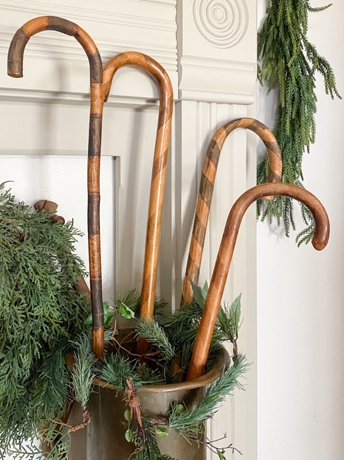 Transform old wooden canes into beautiful Christmas decor with this DIY Wooden Candy Canes tutorial. Simple, budget-friendly, and perfect for holiday decor.