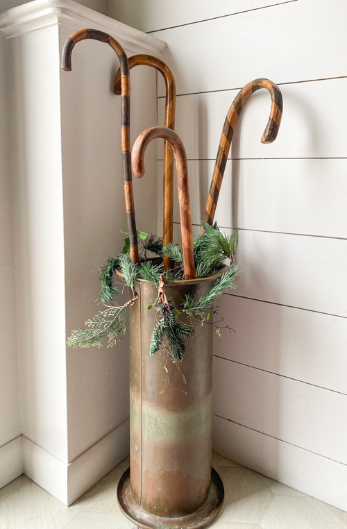 Transform old wooden canes into beautiful Christmas decor with this DIY Wooden Candy Canes tutorial. Simple, budget-friendly, and perfect for holiday decor.