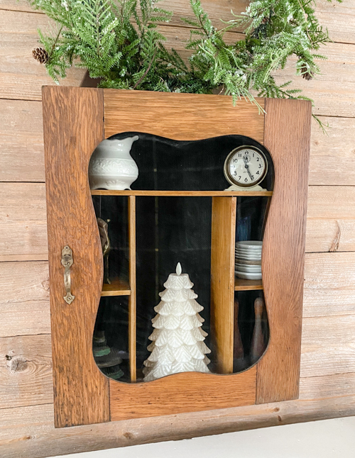 Vintage Wall Cabinet Makeover that shows how a simple back-panel update can refresh the piece while keeping all the original charm and patina.