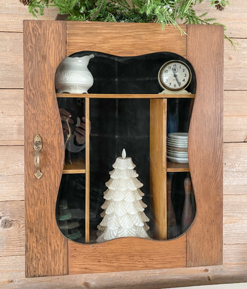 Vintage Wall Cabinet Makeover that shows how a simple back-panel update can refresh the piece while keeping all the original charm and patina.