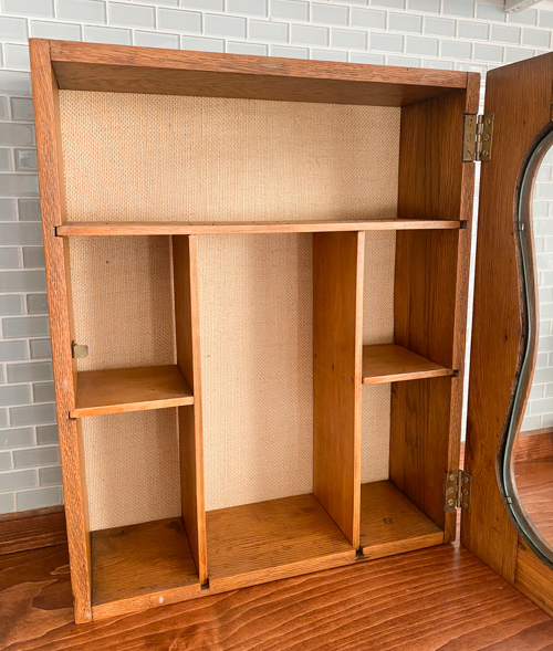 Vintage Wall Cabinet Makeover that shows how a simple back-panel update can refresh the piece while keeping all the original charm and patina.