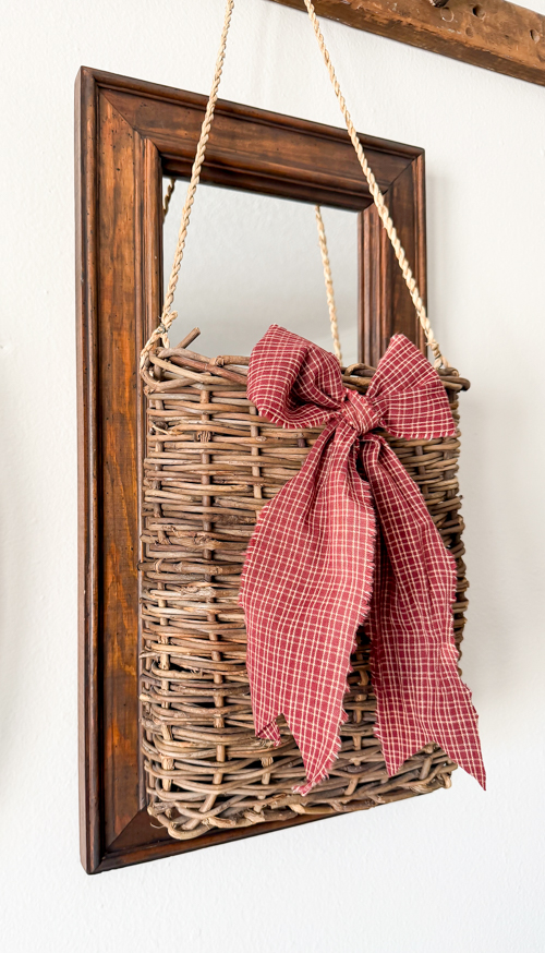 This Black Paint Wash Technique adds age and charm to a thrifted mirror. An easy DIY paint wash that highlights wood grain and character.