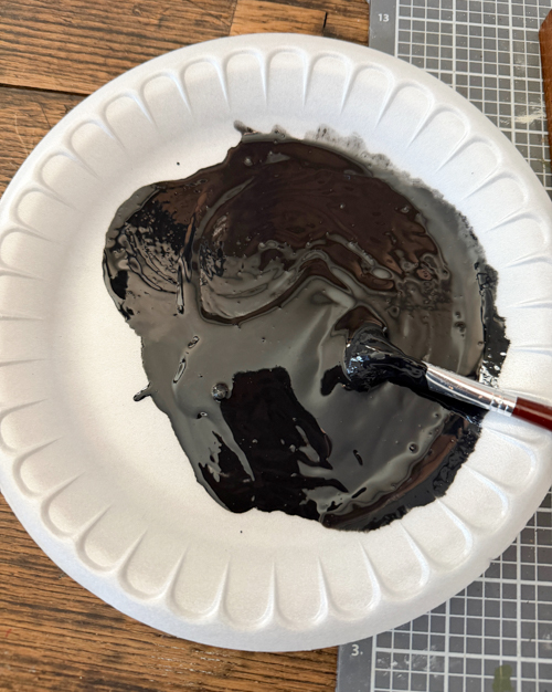 This Black Paint Wash Technique adds age and charm to a thrifted mirror. An easy DIY paint wash that highlights wood grain and character.