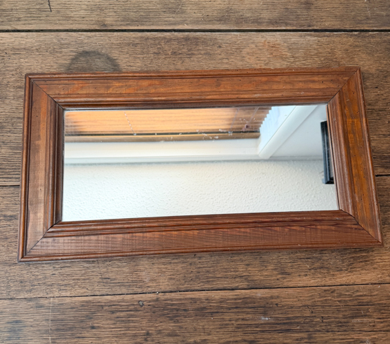This Black Paint Wash Technique adds age and charm to a thrifted mirror. An easy DIY paint wash that highlights wood grain and character.