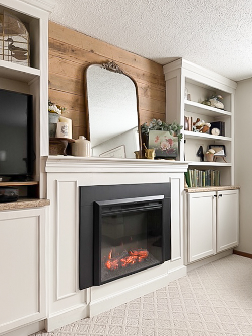 Thinking about an Electric Fireplace Insert Heater? We replaced ours in our family room and share the exact model, fit, and honest review.