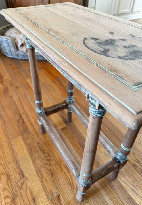 Learn how to remove paint from vintage table surfaces before repainting. Step-by-step tutorial using a heat gun and sanding for best results.