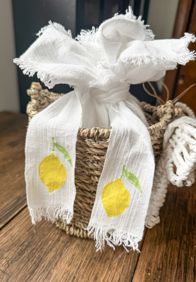 Learn how to decoupage fabric with napkins using an easy iron-on method, no glue needed! Create custom placemats, ribbon, and more with this DIY.
