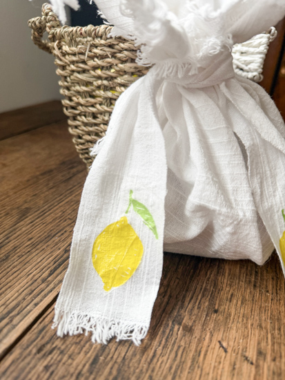 Learn how to decoupage fabric with napkins using an easy iron-on method, no glue needed! Create custom placemats, ribbon, and more with this DIY.