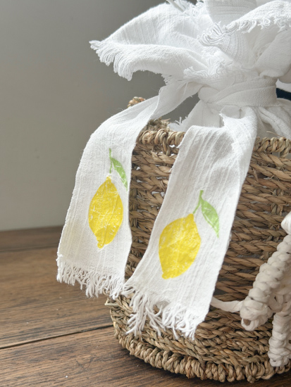 Learn how to decoupage fabric with napkins using an easy iron-on method, no glue needed! Create custom placemats, ribbon, and more with this DIY.