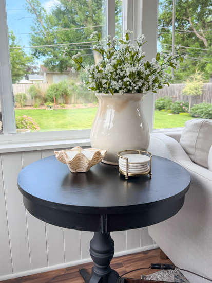 Learn how to complete a vintage table makeover with this easy tutorial. Black paint, simple prep, and easy instructions create a modern, timeless finish.