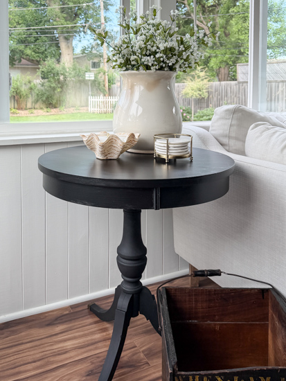 Learn how to complete a vintage table makeover with this easy tutorial. Black paint, simple prep, and easy instructions create a modern, timeless finish.
