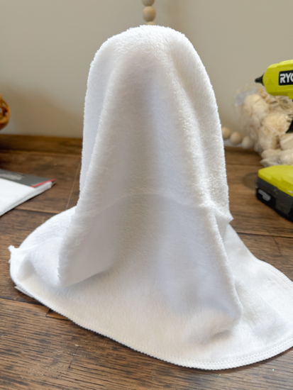 DIY Ghost Halloween Decor made from dollar store supplies is an easy Halloween craft that takes minutes to make and looks adorable in any Halloween display.